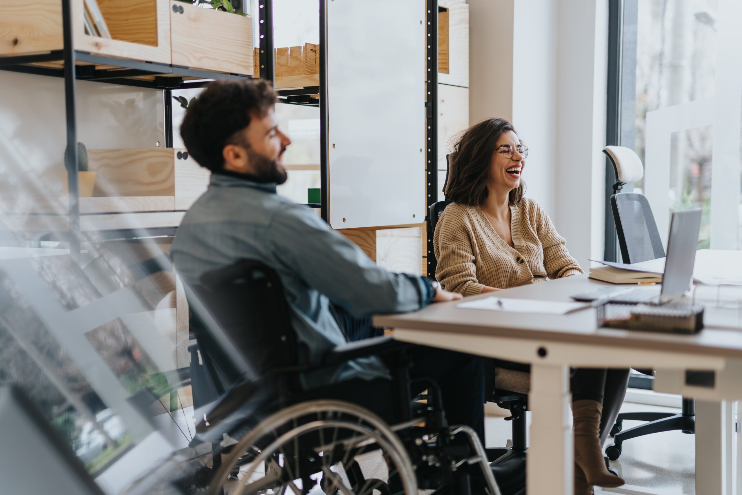 People in a meeting on wheel chairs.